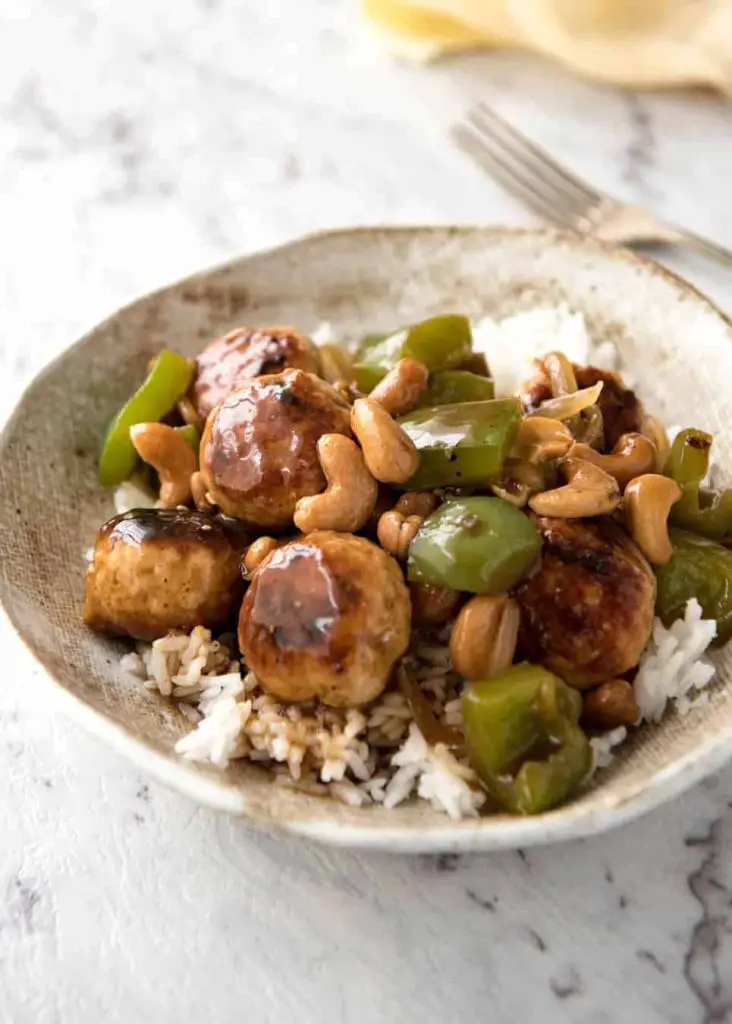 This Chinese Cashew Chicken Meatballs recipe is everything you know and love about Cashew Chicken...made with meatballs! recipetineats.com